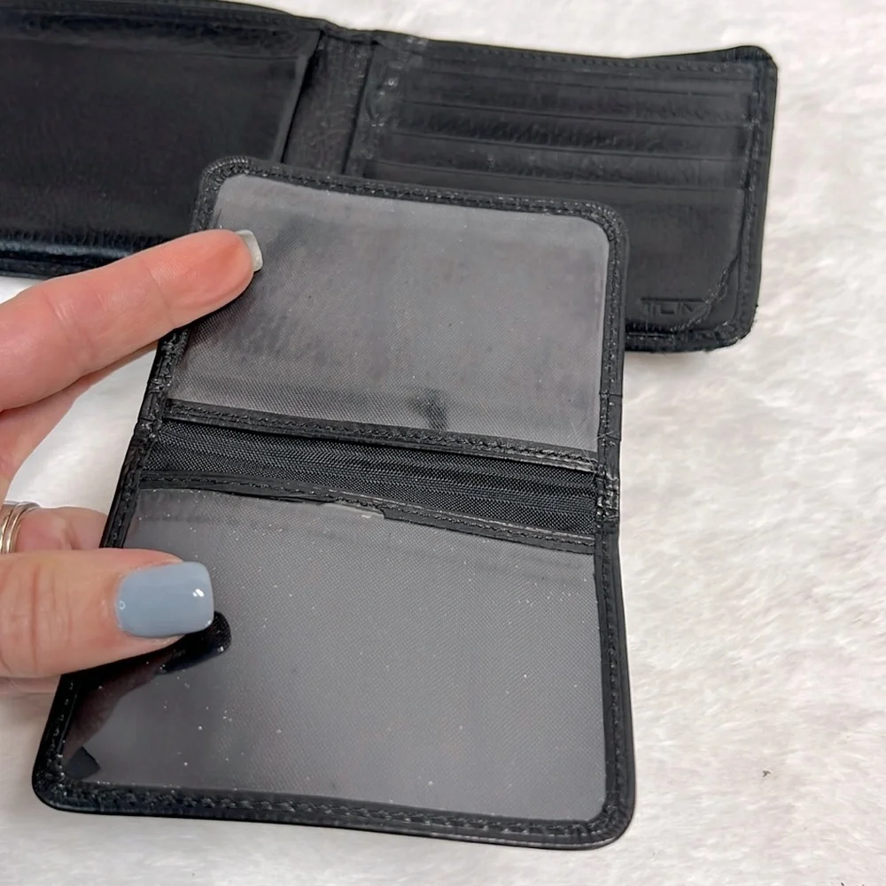 Tumi black leather